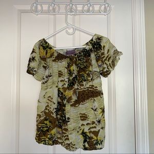 Green, brown, white button down blouse.